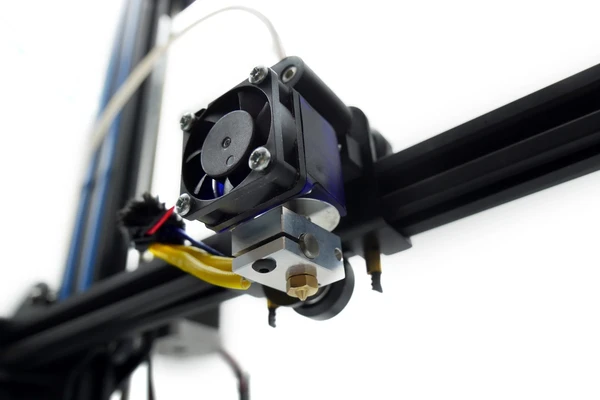 Close-up of a 3D printer hotend component